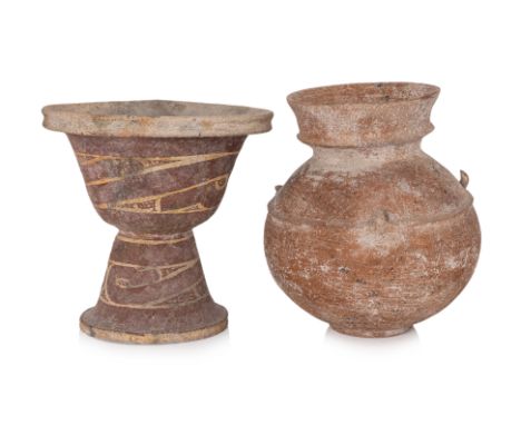 TWO BAN CHIANG POTTERY VESSELS
Terracotta, globular jar with wide everted mouth, three lugs to shoulders, a waisted pedestal 