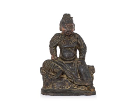 A BRONZE FIGURE OF GUANDI, DATED WANLI 28TH YEAR Ming dynasty, modelled wearing a robe over armour, raised scrolling to hems 