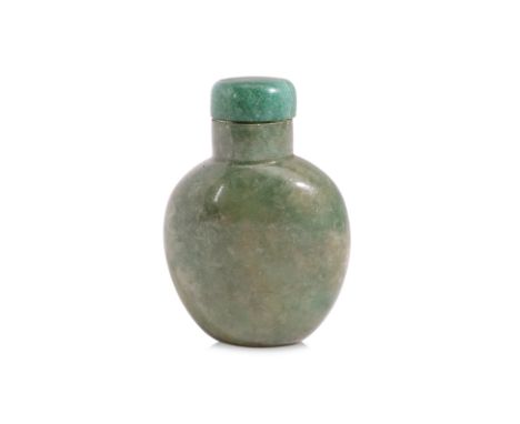 A JADE SNUFF BOTTLE
Oviform bottle with wide shoulders narrowing to the foot, semi-transparent green jade, with jade stopper,