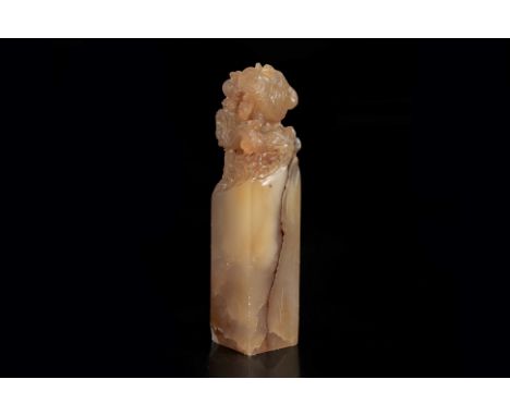 A CARVED SOAPSTONE 'DRAGON AND PHOENIX' SEAL
The square section seal carved to the top with an entwined dragon and phoenix cl