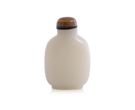 A WHITE JADE SNUFF BOTTLE Compressed rectangular form with rounded sides, raised and recessed oval foot rim, agate stopper, 1