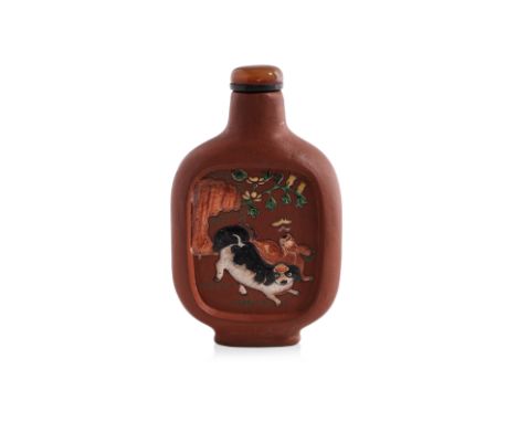 A YIXING STONEWARE 'PEKINGESE DOGS AND PIGEONS' SNUFF BOTTLE Daoguang period, compressed rectangular form with rounded sides,