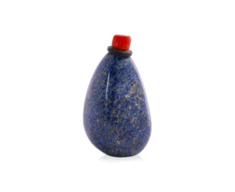 A LAPIS LAZULI SNUFF BOTTLE
Of plain pebble form, flattened base
5cm high
Ownership Statement: This item is offered for sale 