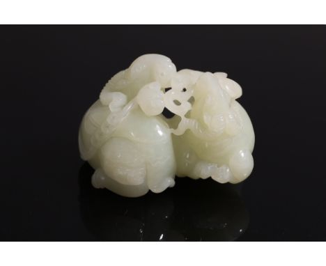 A JADE CARVING OF TWO RAMS
The two recumbant rams modelled facing each other
7.5cm wide
Ownership Statement: This item is off