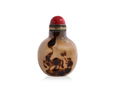 A CARVED AGATE 'MONKEY AND HORSE' SNUFF BOTTLE
Compressed ovoid form tapering to a narrow recessed oval foot, semi-opaque and