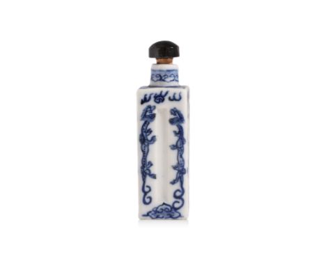 A BLUE AND WHITE PORCELAIN SNUFF BOTTLE
Square form with fluted sections to sides, decorated in dragons and flaming pearls, r