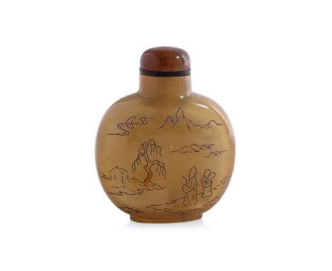 AN INCISED CHALCEDONY SNUFF BOTTLE
Flattened oviform bottle in soft caramel tones, decorated in landscape scenes with figures