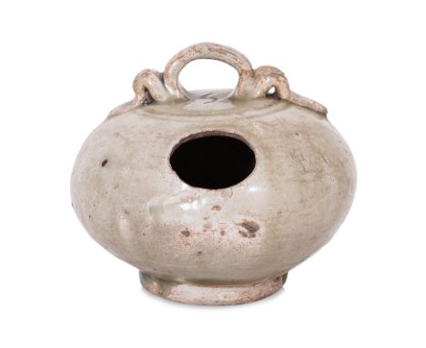 A SMALL VIETNAMESE LIME POT
12th-14th century, globular pot with strap handle and oval hole, transparent pale-green glaze, up