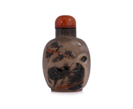 A CARVED AGATE 'WATER BUFFALO' SNUFF BOTTLE
Compressed rectangular form with rounded sides, grey and black agate with occasio