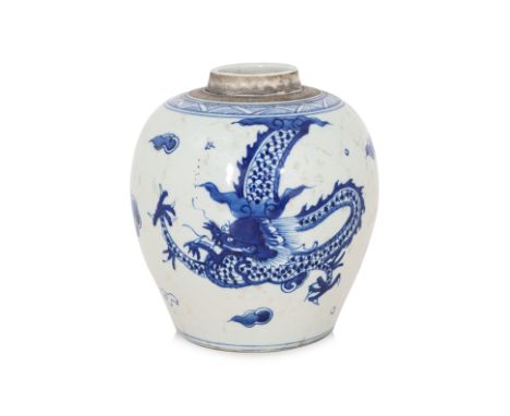 A BLUE AND WHITE DRAGON DECORATED JAR
Decorated in single dragon flying though clouds, triangular border to shoulders, glazed