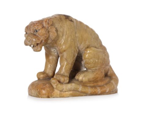 A CARVED SOAPSTONE MODEL OF A TIGER
Probably late Qing, 19th/early 20th century, well modelled resting on its haunches
7cm hi