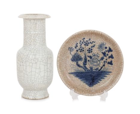 A CRACKLE GLAZED PORCELAIN VASE AND PLATE
19th/20th Century, A shallow plate decorated in underglaze blue wtih flowering foli
