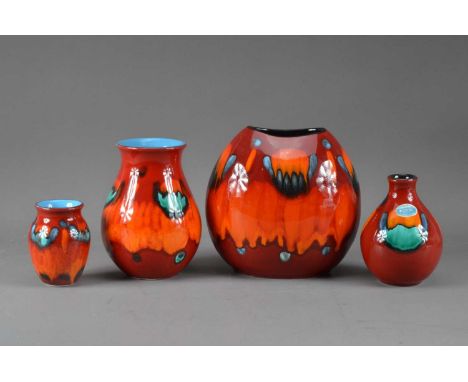 Four Poole pottery vases, all with the same glazes, of differing sizes, the largest 19cm high, the smallest 10cm high, all wi