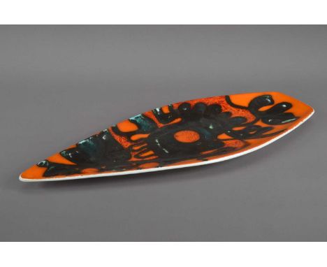 A Poole pottery shaped kite platter, orange ground with black design, marked to the underside, 43cm in length a chip to the u
