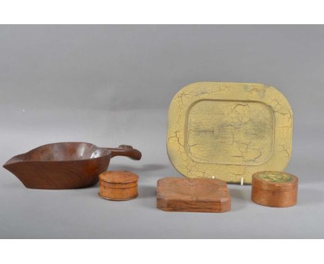 A small collection of treen items, comprising a Walnut leaf shaped handled vessel, 'English Walnut' incised to the underside,