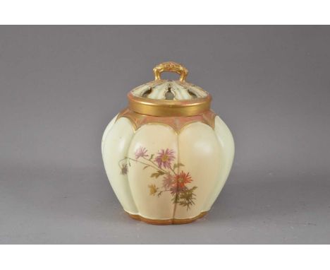 A 20th century Royal Worcester urn with pierced cover, blush ivory and gilt work, the cover cracked and repaired, AF, marked 