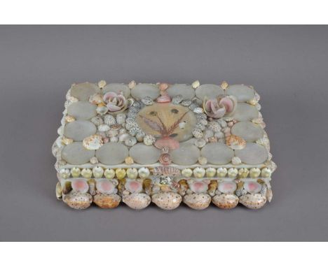 A Shell mounted box, decorated in an assortment of shells and mother of pearl Chinese tokens, each featuring a crest, togethe