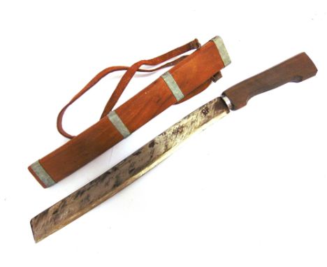 A BELIZEAN SUGAR CANE KNIFE  the 38.5cm blade marked 'RP', with a carved wood grip and a wood scabbard, overall 57cm long.