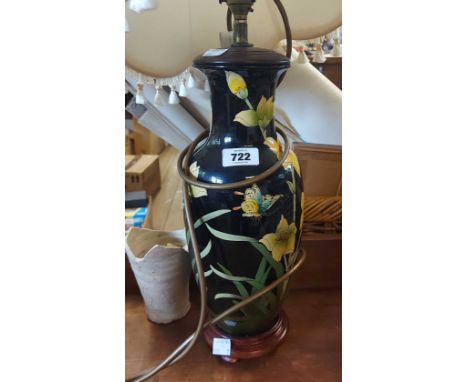 An Oriental style ceramic table lamp with floral and butterfly decoration