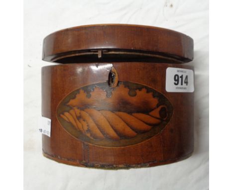 An early 19th Century mahogany and strung tea caddy of elliptical form with conch shell inlaid to lid and front and with orig