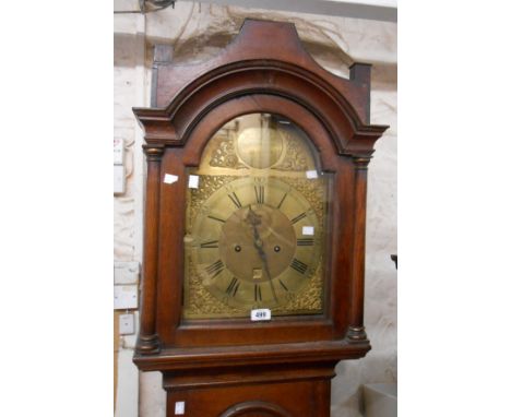A late 18th Century oak longcase clock, the 29.5cm brass arched dial marked for Robert Davy of Leiston with subsidiary second