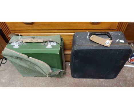 A vintage manual typewriter - sold with a picnic set in green case