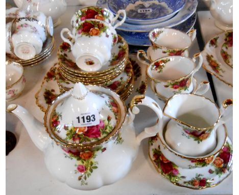 A Royal Albert bone china tea set decorated in the 'Old Country Roses' pattern comprising teapot, six trios, milk jug, sugar 