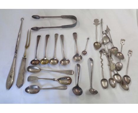 A bag containing a quantity of silver small spoons and sugar tongs, a silver handled button hook and an 800 grade handled for