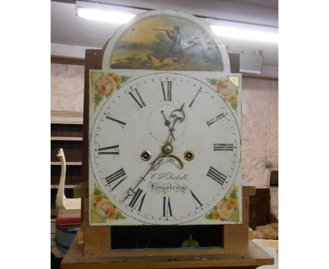 A 19th Century stripped wood longcase clock, the 30.5cm painted arched dial marked for C.P. Tickell of Kingsbridge with secon