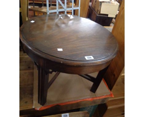 A 60cm diameter late 19th Century walnut tea table, set on moulded supports with pierced X-stretcher