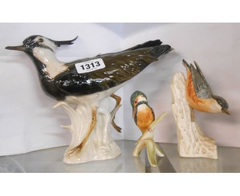 A large Goebel porcelain figurine, depicting a lapwing - sold with two smaller Goebel figurines
