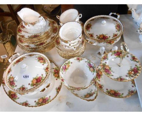 A quantity of Royal Albert bone china tableware decorated in the 'Old Country Roses' pattern including vegetable tureens, pla