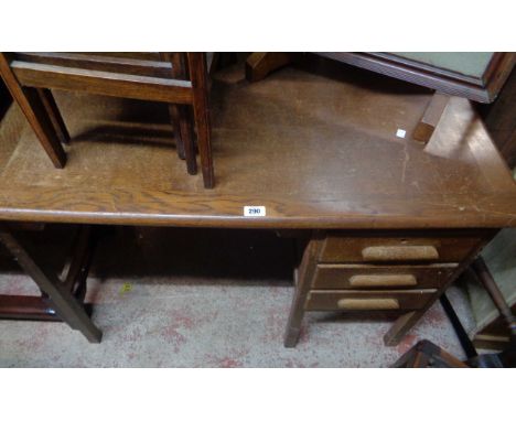 A 1.05m vintage oak single pedestal desk with three pedestal drawers, set on square legs