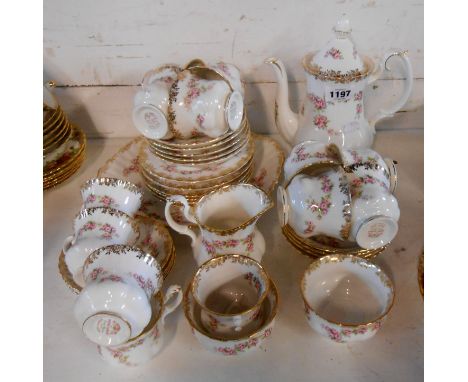 A quantity of Royal Albert bone china tea and coffee ware decorated in the 'Dimity Rose' pattern including coffee pot, cups, 