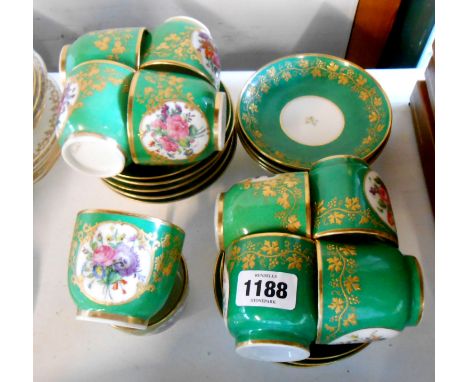A mid 19th Century porcelain part tea set comprising ten cups and saucers (and two spare saucers), each cup decorated with a 