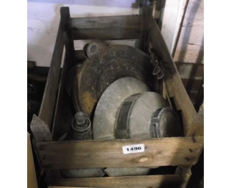 A crate containing a set of cast iron scales and an old mincer - sold with a wooden box containing old greenhouse heaters, et