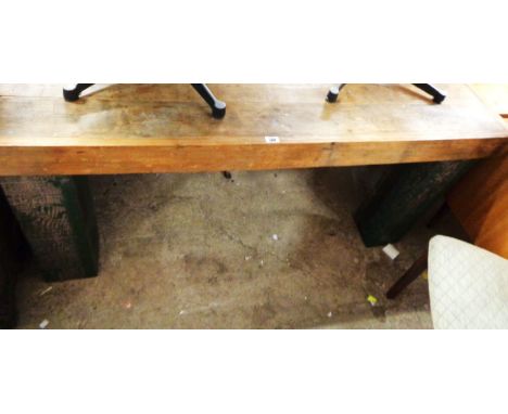 A 1.58m rustic reclaimed pine table with six plank top, set on massive square legs - bearing brass plaque stating 'Wood from 