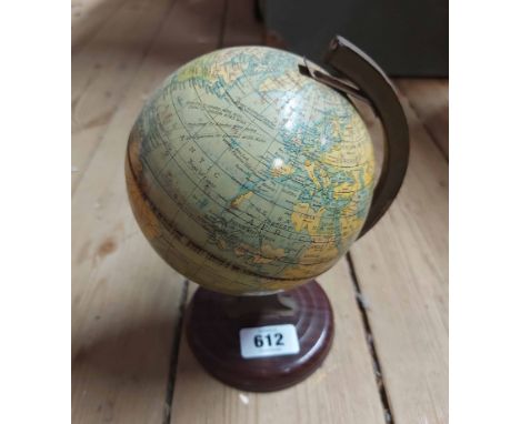 A small vintage Chad Valley tin plate globe on stand