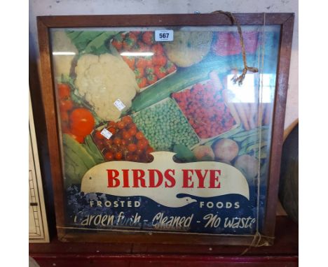 A vintage framed 'Bird's Eye' trade card, with printed vegetables to back and branding to the glass panel