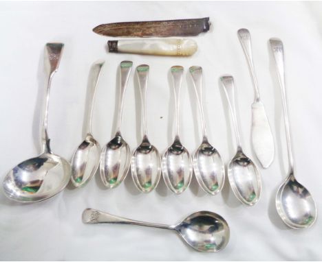 A bag containing assorted silver cutlery including ladle, teaspoons and damaged cake knife