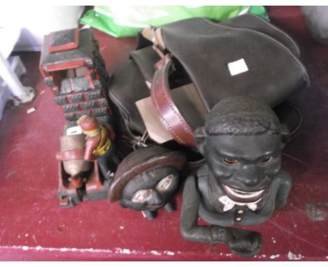 Three vintage cast iron novelty money boxes including an Artillery Bank example - sold with a gun bag Notice from the the-sal