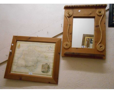 A rustic pine framed wall mirror with applied natural rope decoration and shelf under - sold with a pine framed Devonshire ma