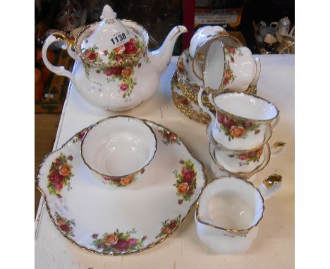 A Royal Albert bone china part tea set, decorated in the 'Old Country Roses' pattern comprising teapot, milk jug, sugar bowl,