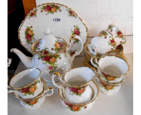 A Royal Albert bone china tea set decorated in the 'Old Country Roses' pattern comprising teapot, milk jug, sugar bowl, six t