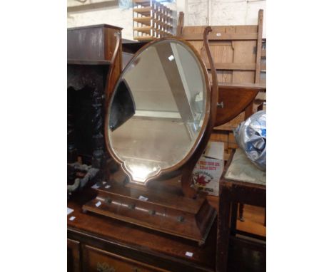 A late Victorian mahogany platform dressing table mirror with shaped bevelled plate, set on lyre supports and three drawer wa