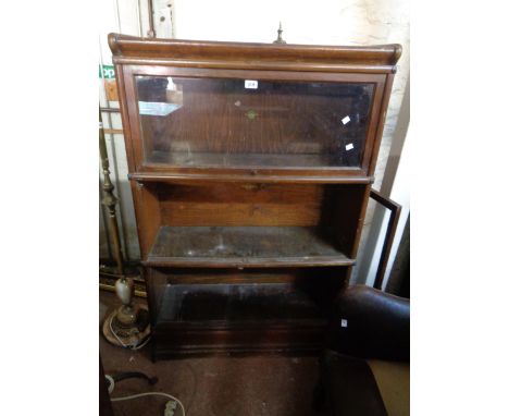 An 86cm vintage Globe Wernicke stained mixed wood three section modular bookcase with cornice and base - with matching labels
