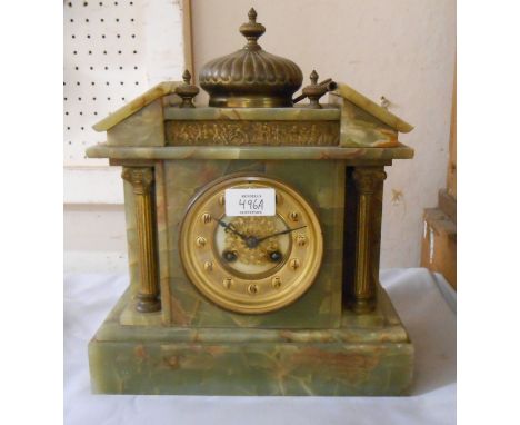 A late Victorian onyx cased mantel clock of architectural design with flanking pillars and replacement Mougin 'silver medal' 