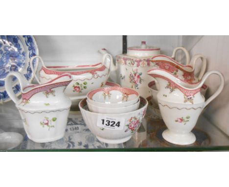 A quantity of 18th Century Newhall porcelain teaware including teapot, tea bowl, milk jugs, etc. - various condition