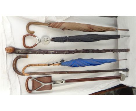 A vintage Swane-Brigg umbrella shooting stick with aluminium handle - sold with a further quantity of vintage shooting sticks