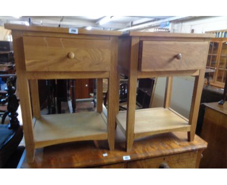 A pair of 50cm modern light oak bedside tables, both with single drawer and undertier